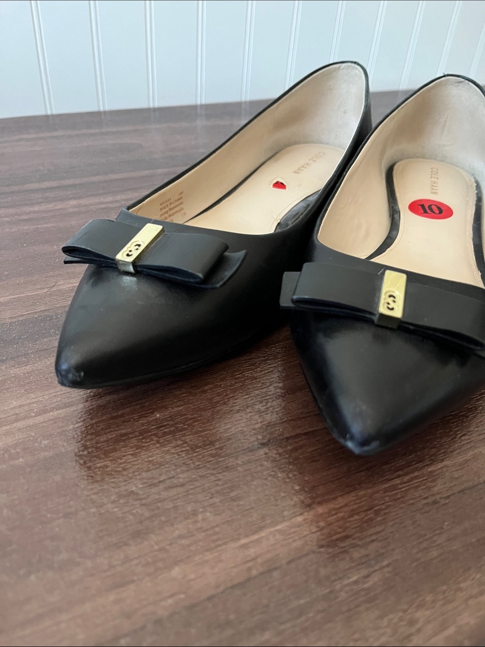 Cole Haan Black Pointed Toe Bow Flats with Gold Accent - Picture 2 of 7